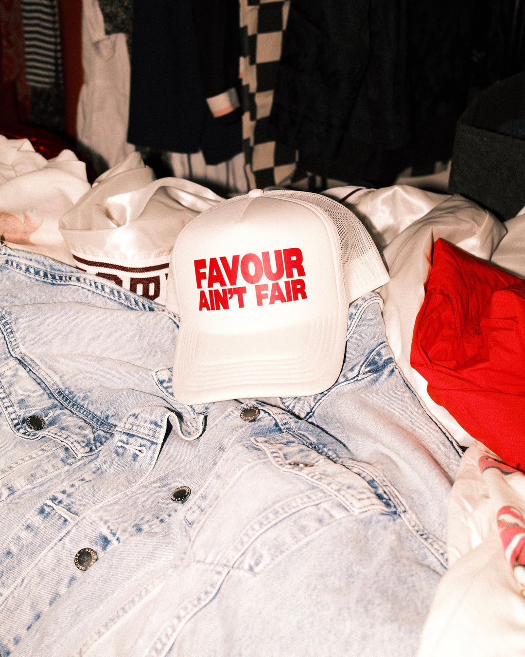 FAVOUR AIN’T FAIR TRUCKER HAT